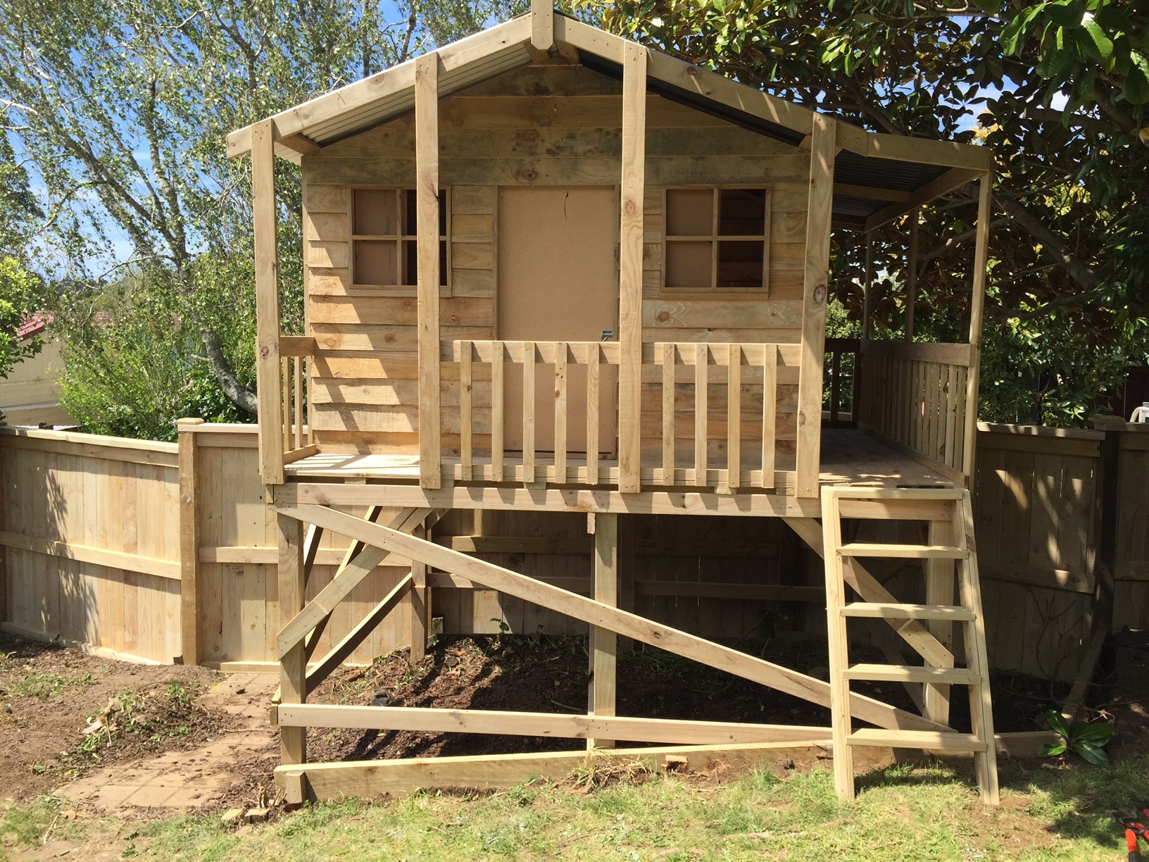 Deluxe Playhouses DK Custom Cabins